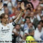 Luka Modric waves to fans at Santiago Bernabéu during a tribute event, highlighting Luka Modric Net Worth 2026: $75 Million Breakdown.