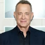 Tom Hanks portrait for Tom Hanks Young 2026 article highlighting his journey from a challenging childhood to Hollywood success.