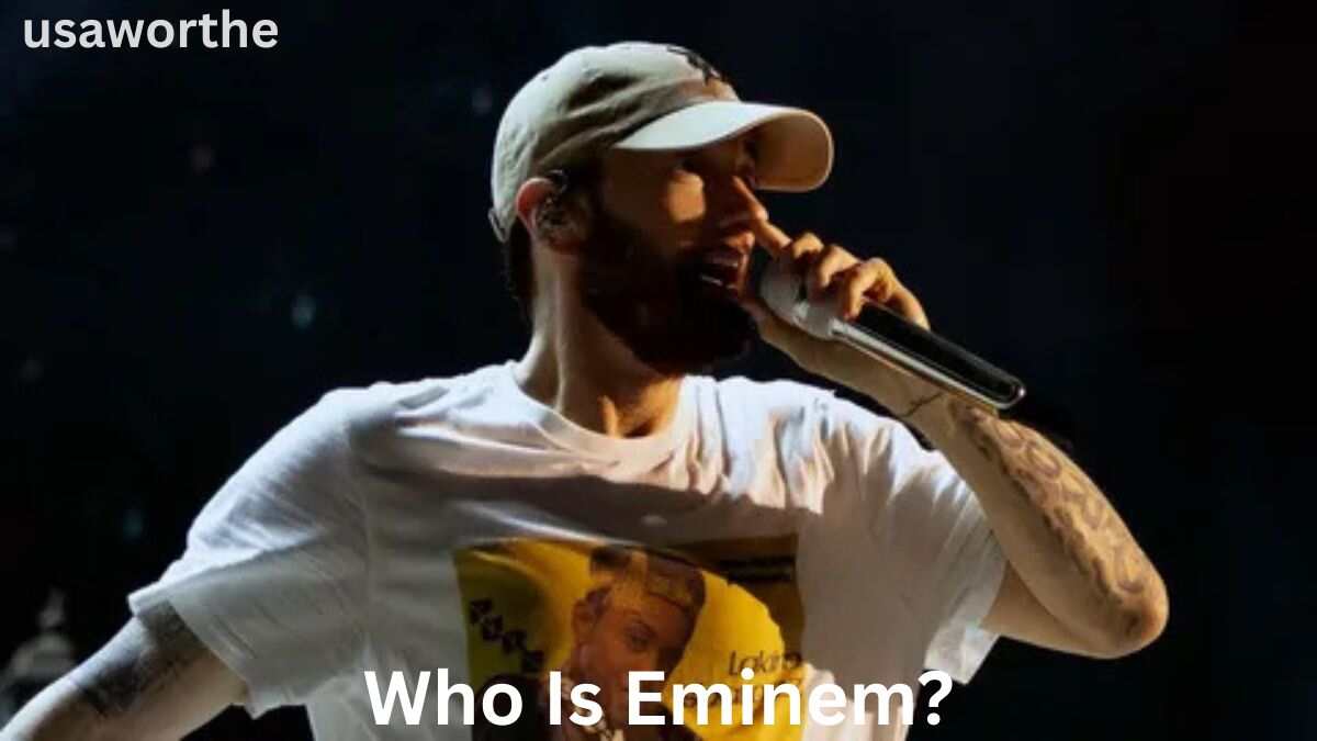 Eminem Net Worth 2026 image of Eminem performing on stage during a live concert