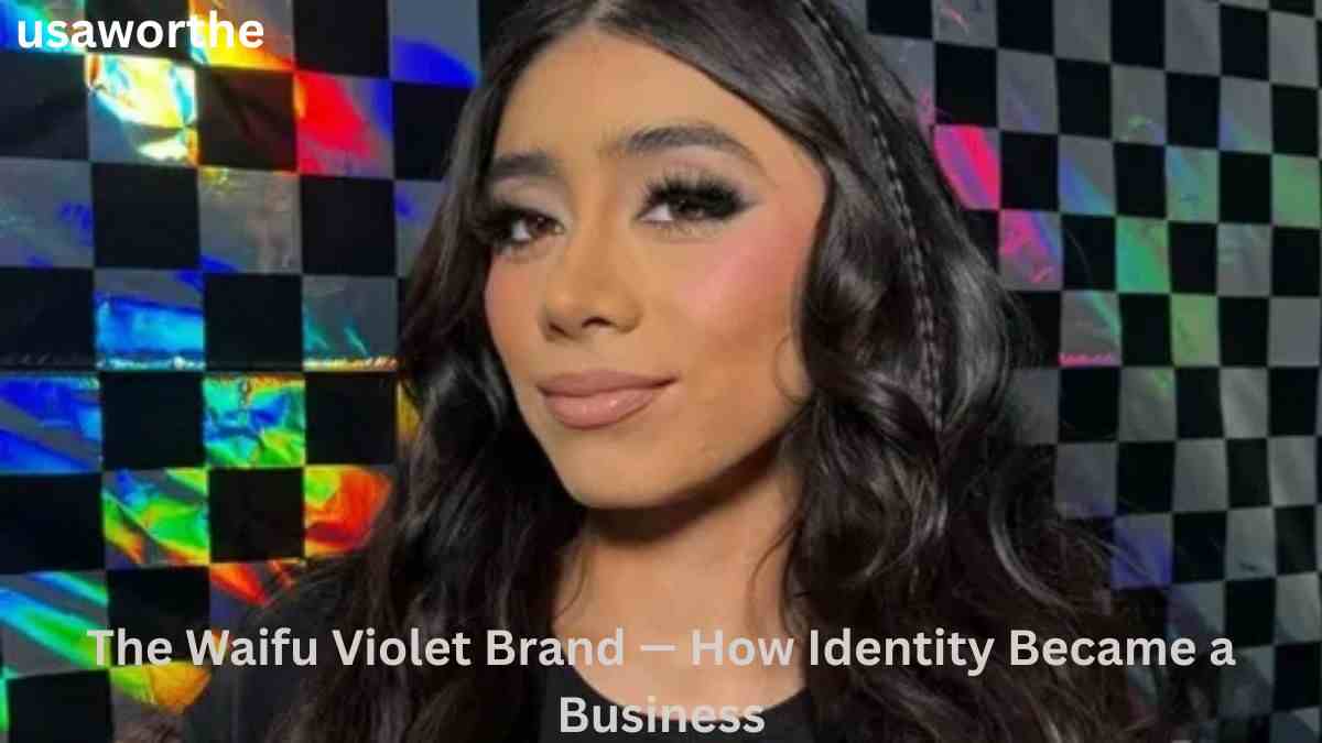 Violet Myers posing in front of a colorful checkered backdrop, representing the Waifu Violet brand and her successful personal branding strategy.