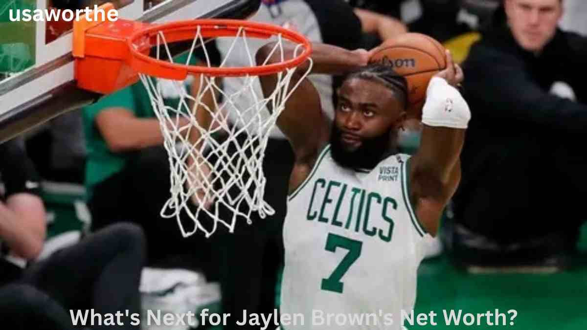 Jaylen Brown dunks the basketball during a Boston Celtics game, highlighting the future earning potential behind Jaylen Brown Net Worth 2026 through NBA contracts, endorsements, and investments.