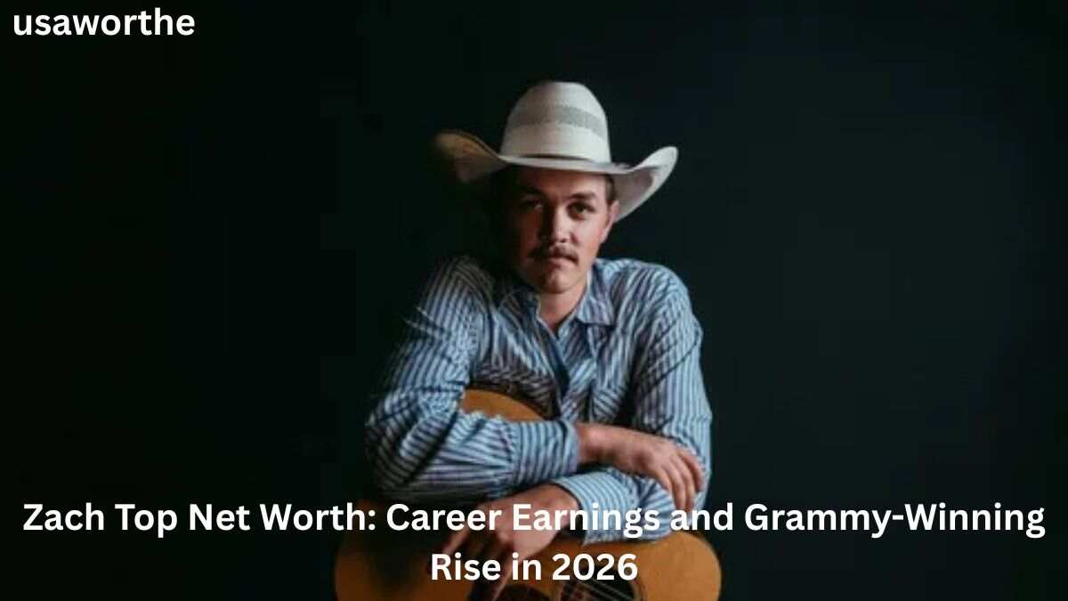 Zach Top Net Worth – Country star Zach Top posing with an acoustic guitar, showcasing his Grammy-winning rise, career earnings, and success in 2026.